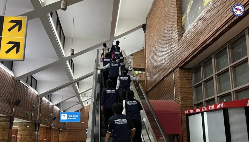 Insured cleaning crew working on a repeat contract at Nepal's busiest airport