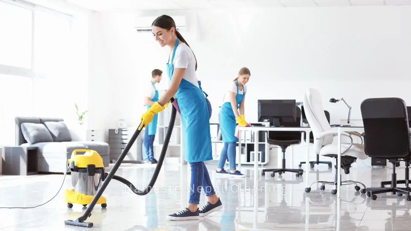 A cleaner vacuuming floor ft. commercial cleaning services in Kathmandu